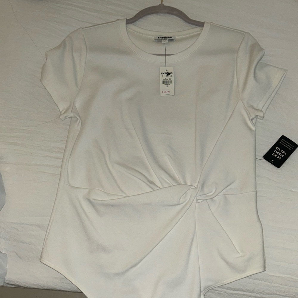 NWT express body suit. Size medium.